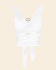 white rouched top on beige background