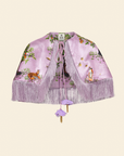 Purple cape with animal prints on a beige background