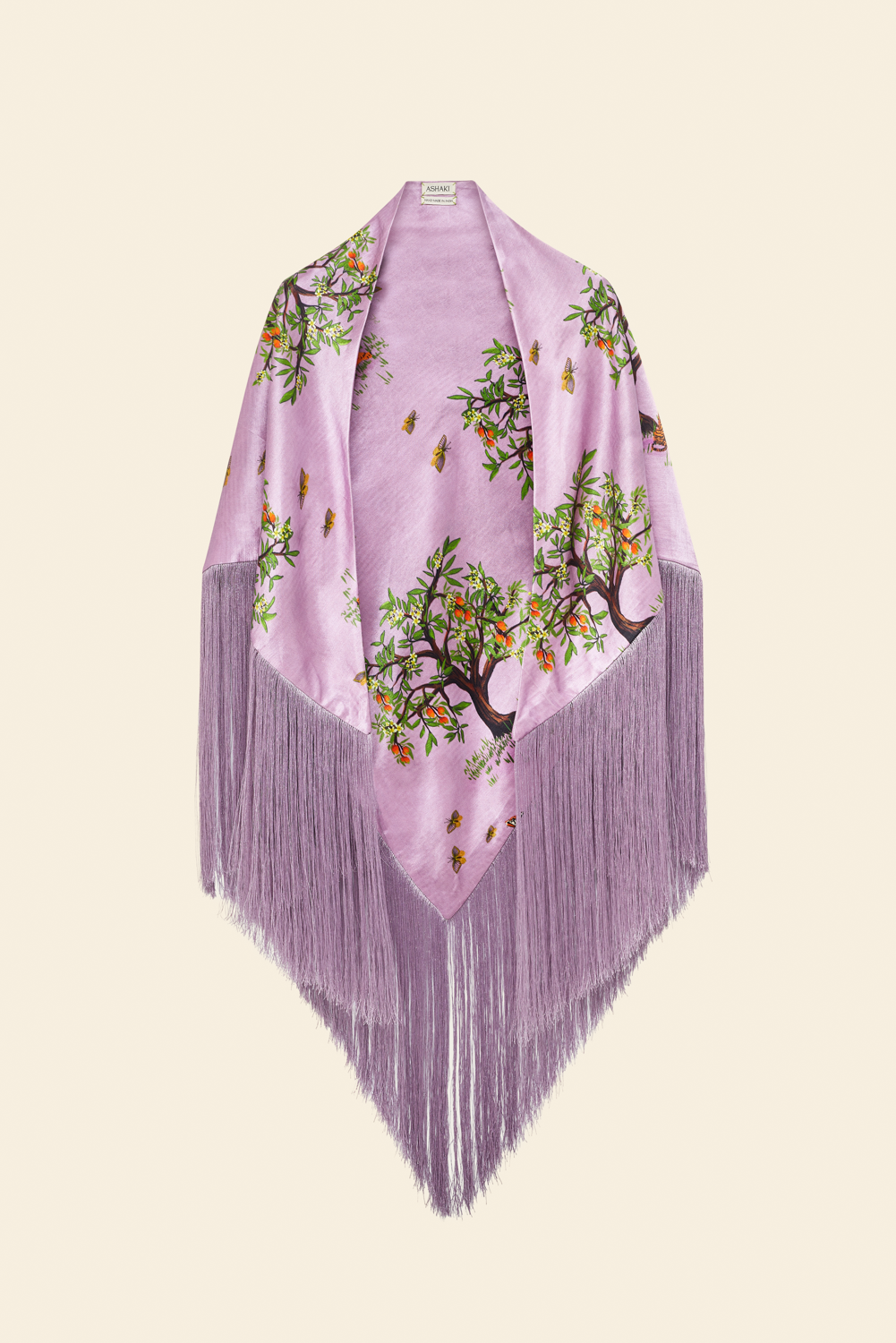 A purple scarf with a floral pattern and fringe detailing along the edges.