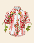 A short-sleeved embroidered shirt with a floral pattern and red and white stripes, featuring green leaf embellishments.