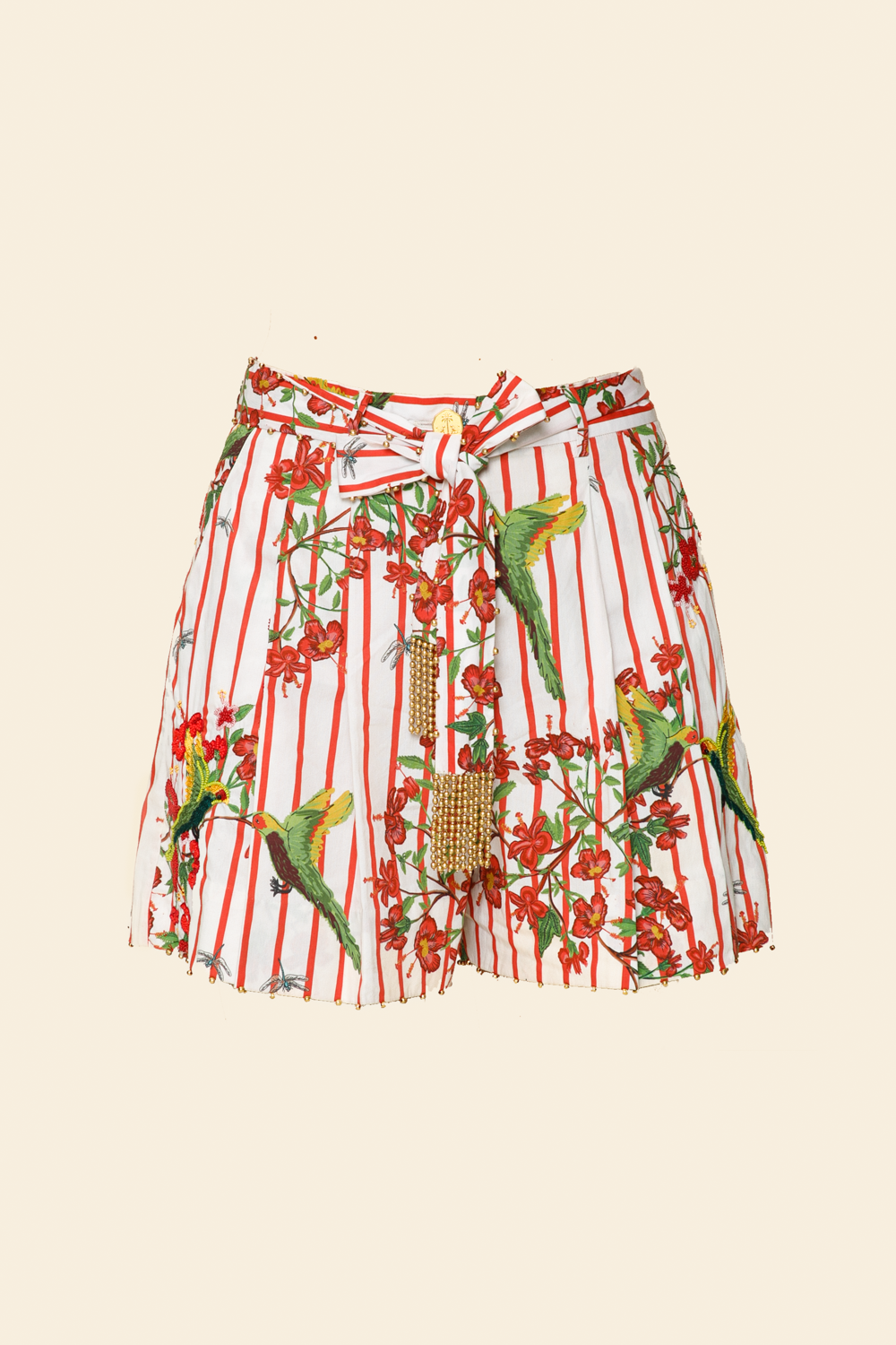 Shorts with a colorful parrot and floral pattern on a beige background
